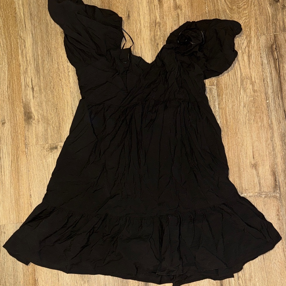 Elegant Black Dress with Ruffle Details